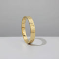 Gold bracelet  with a neutral background