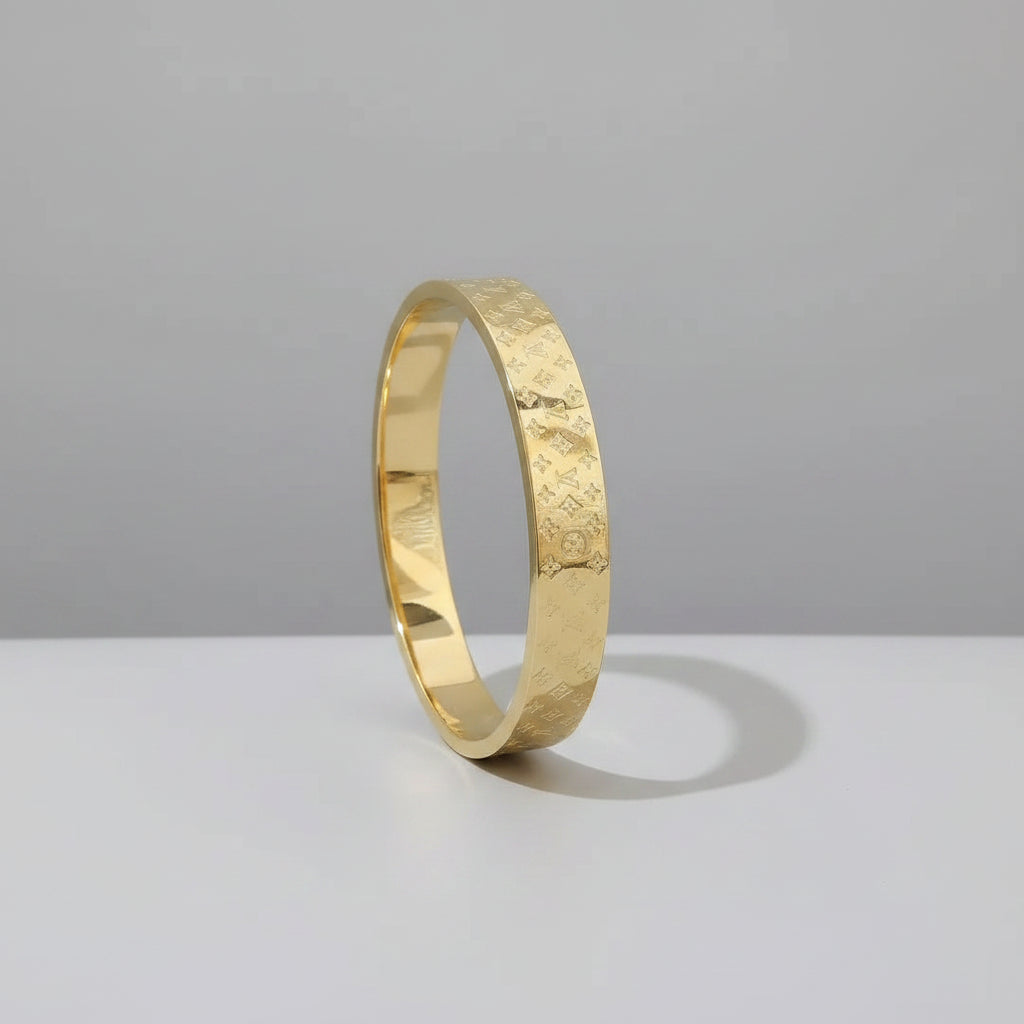 Gold bracelet  with a neutral background
